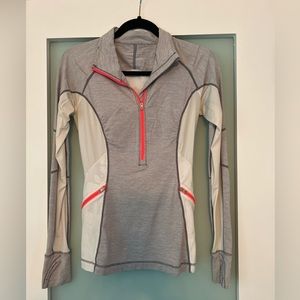 Long sleeve, half zip-up tee. With pockets